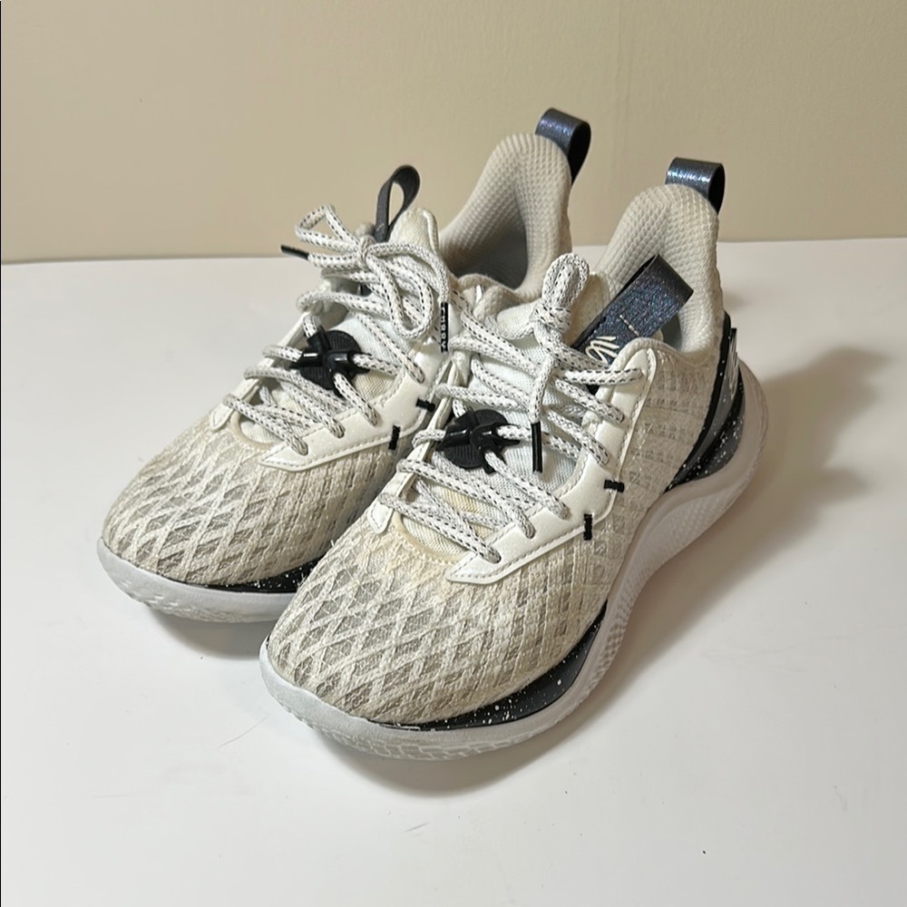 White and Black Sneakers with Textured Upper and Raised Heel
